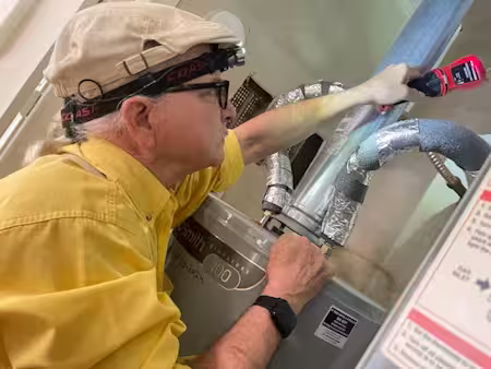 inspector testing water heater